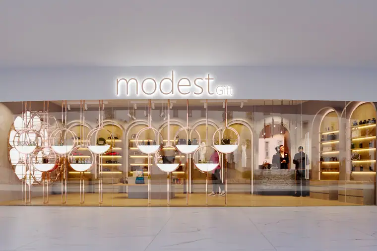 Illuminated shopfront signage and branding by AGC for Modest Gift